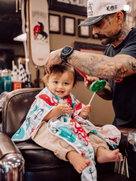 Kid's first haircut at Old Town Barbers